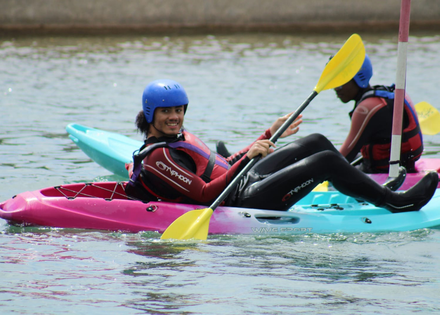 2 people kayaking.